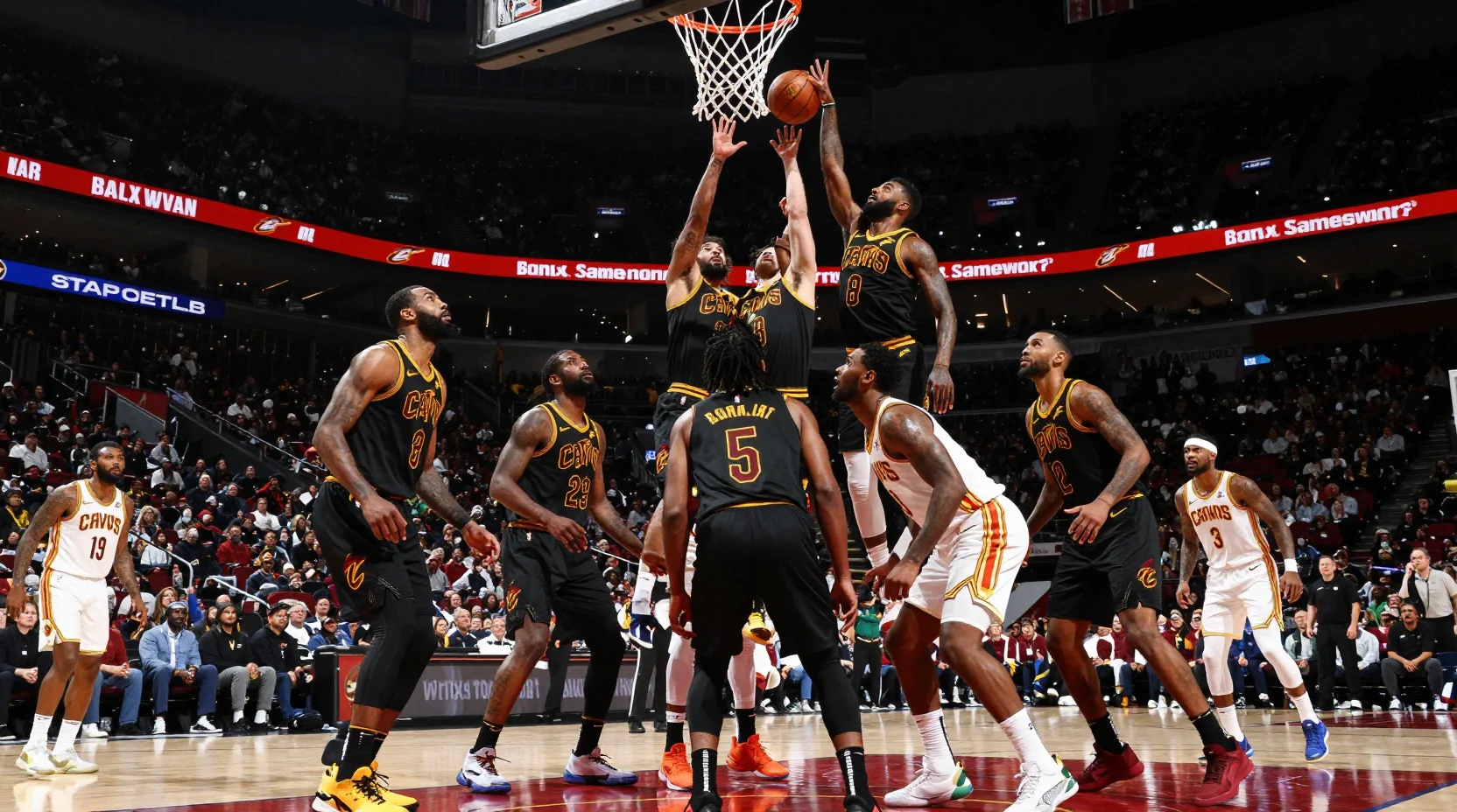 NBA game scene showing intense competition between Kings and Cavaliers