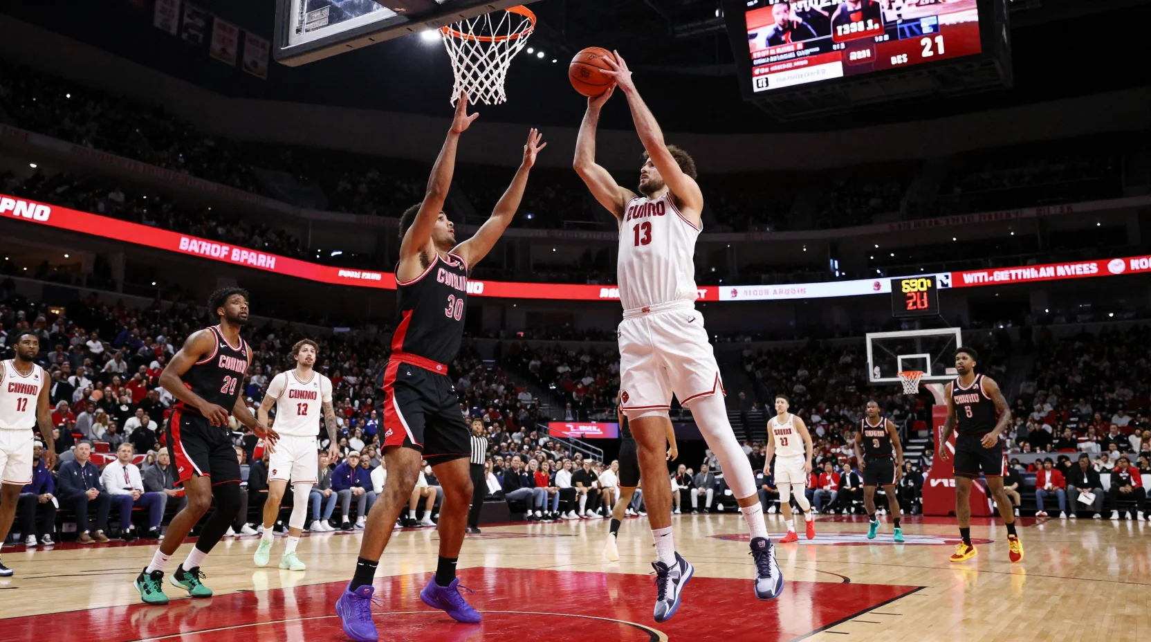Intense college basketball arena scene before tip-off