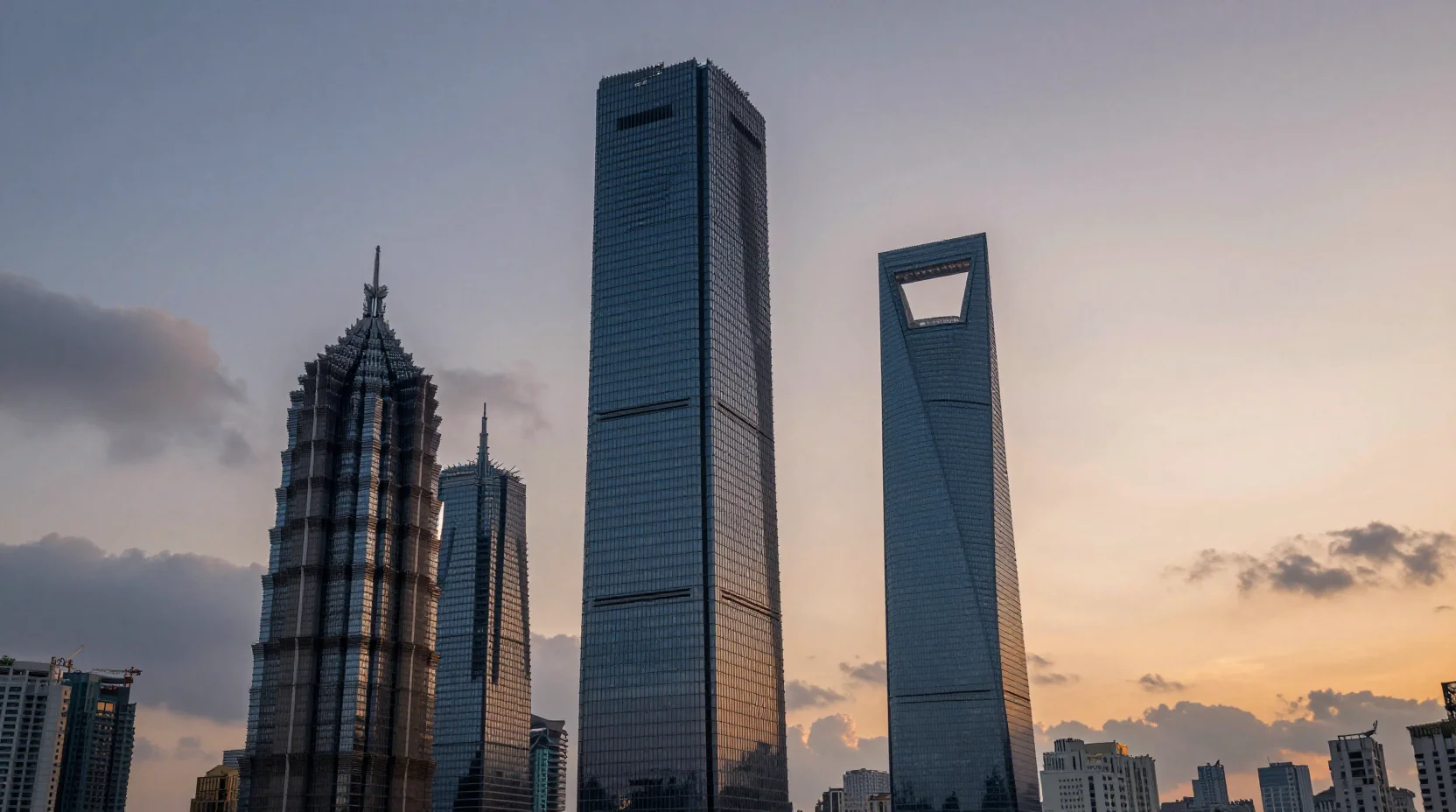 Three corporate towers rising above clouds representing tech giants competing for market cap leadership