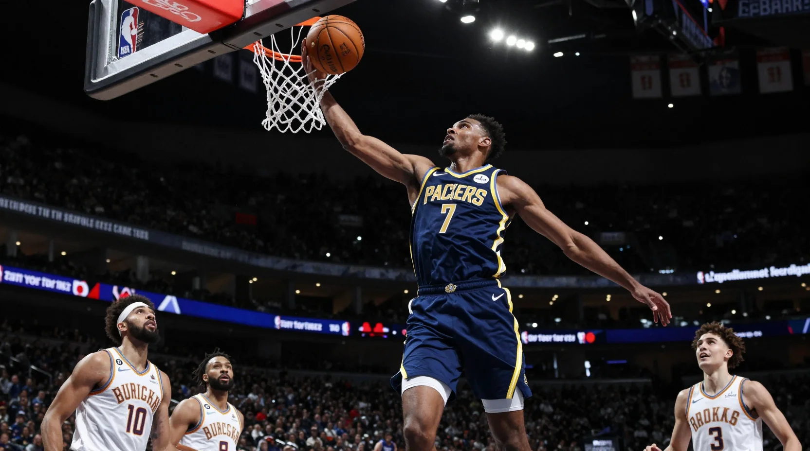 Intense NBA game moment with Pacers player driving to the basket