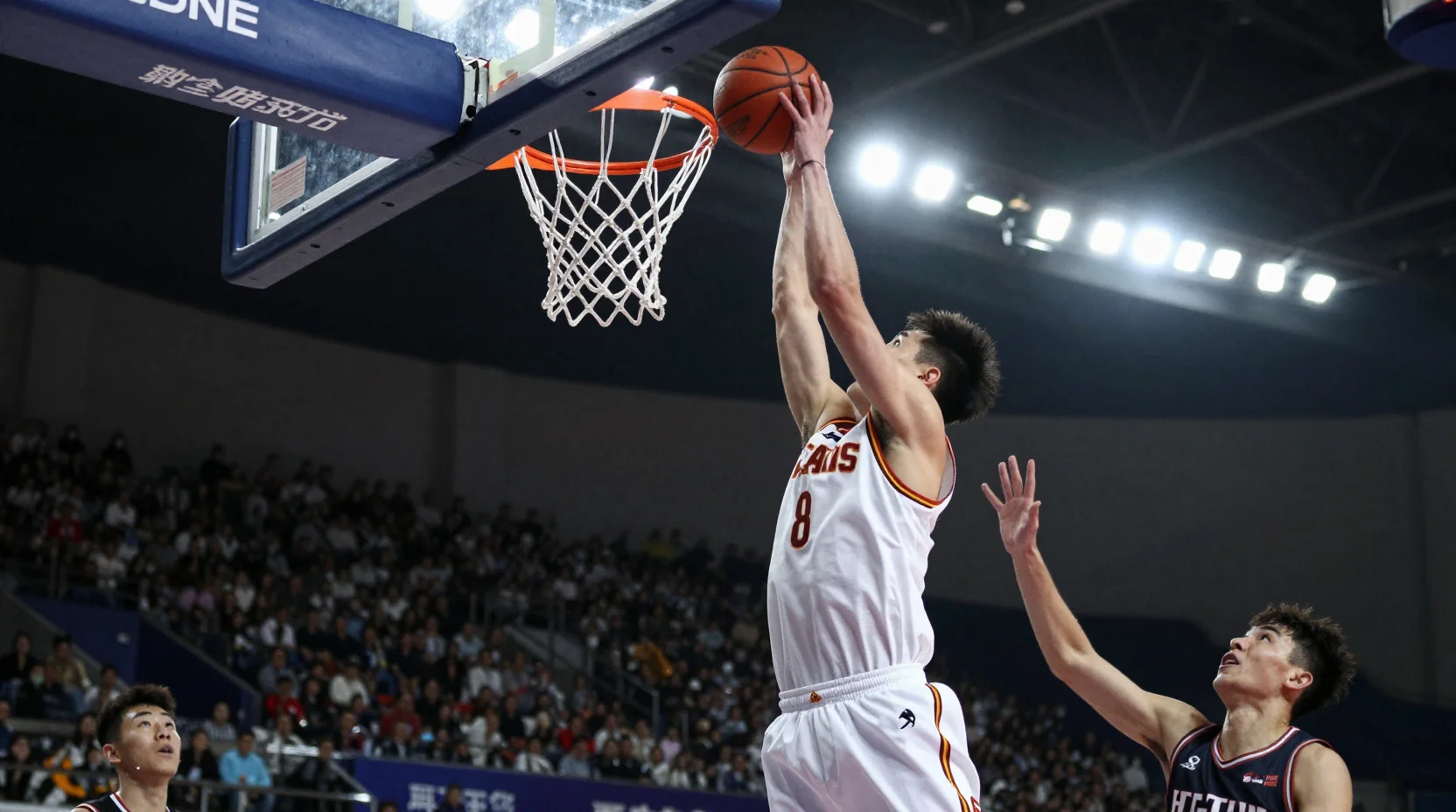 Dramatic basketball game moment with player going for a layup