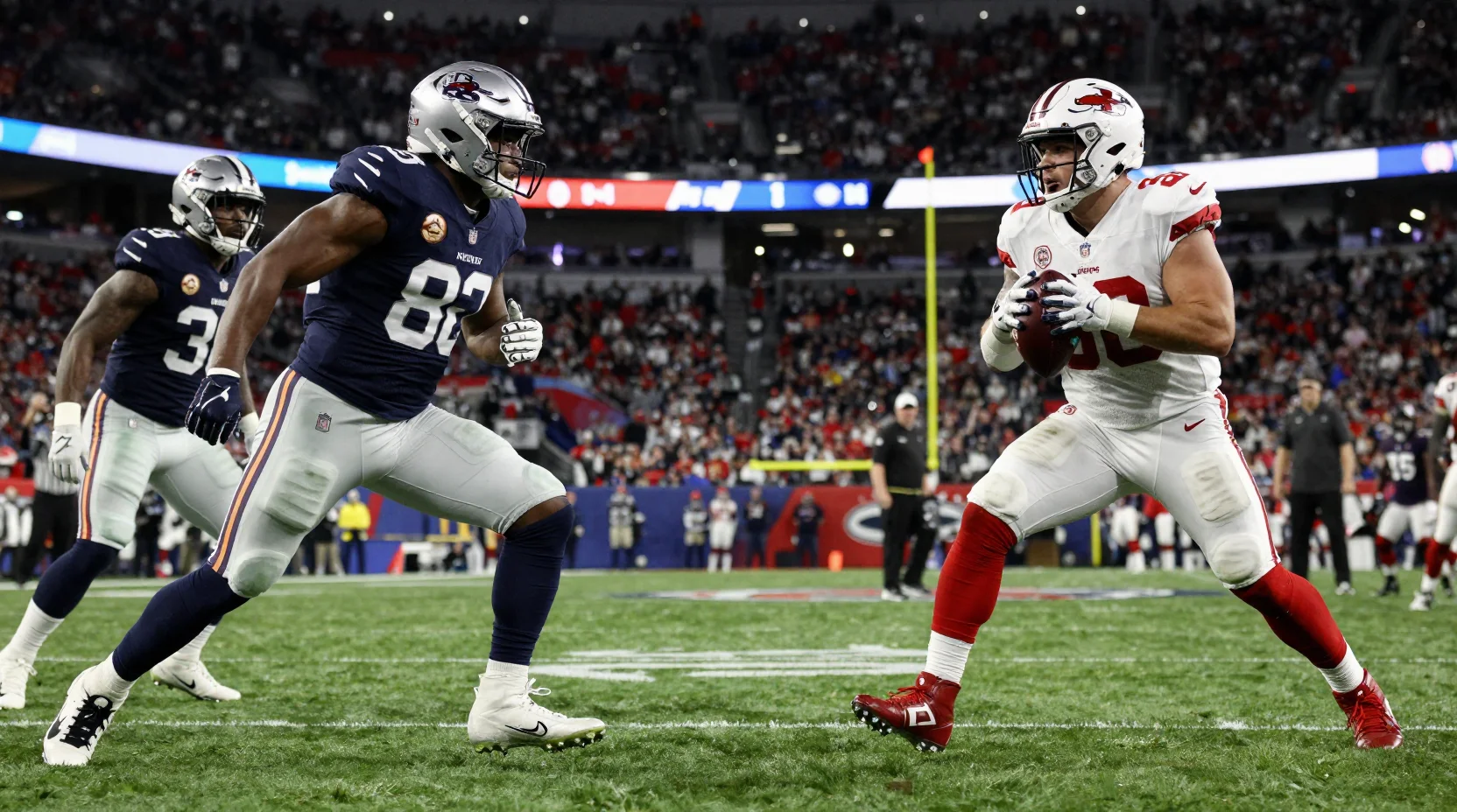 Dramatic NFL playoff showdown between Patriots and Broncos under stadium lights