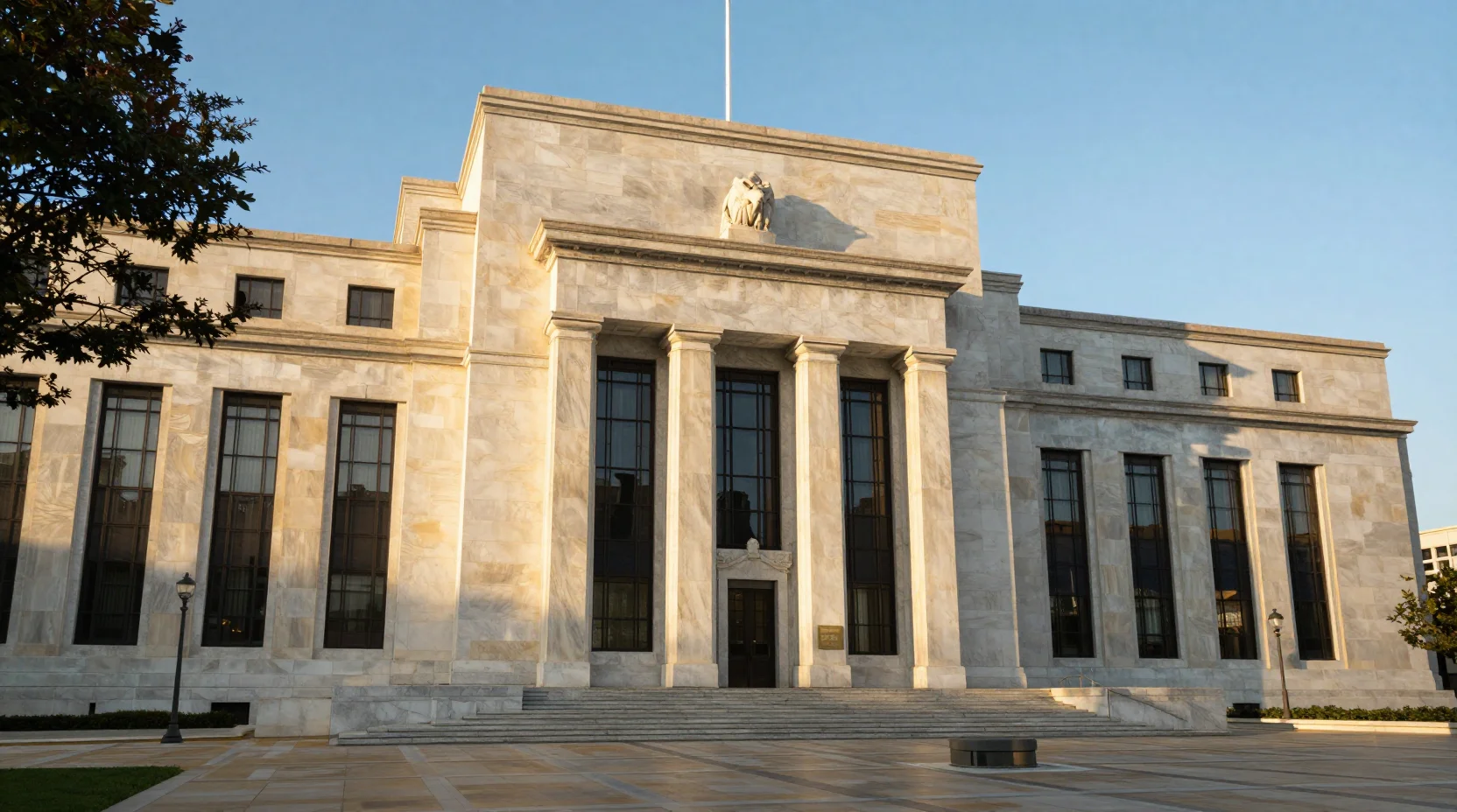 Federal Reserve building at golden hour representing stability and deliberate policy