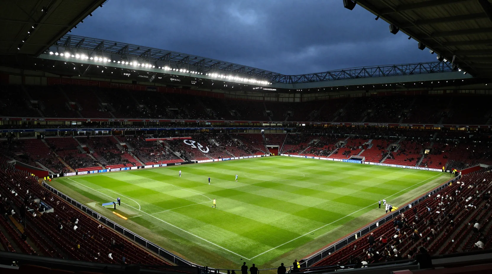 Dramatic stadium scene at dusk capturing the anticipation of a crucial Premier League match