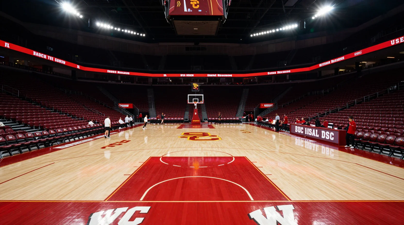 College basketball arena scene with dramatic lighting
