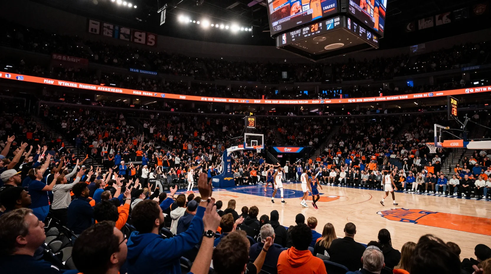 NBA basketball arena scene showing intense game action between Knicks and Raptors